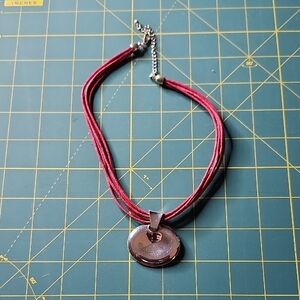 Elegant Silver Pendant Necklace with Red Cord